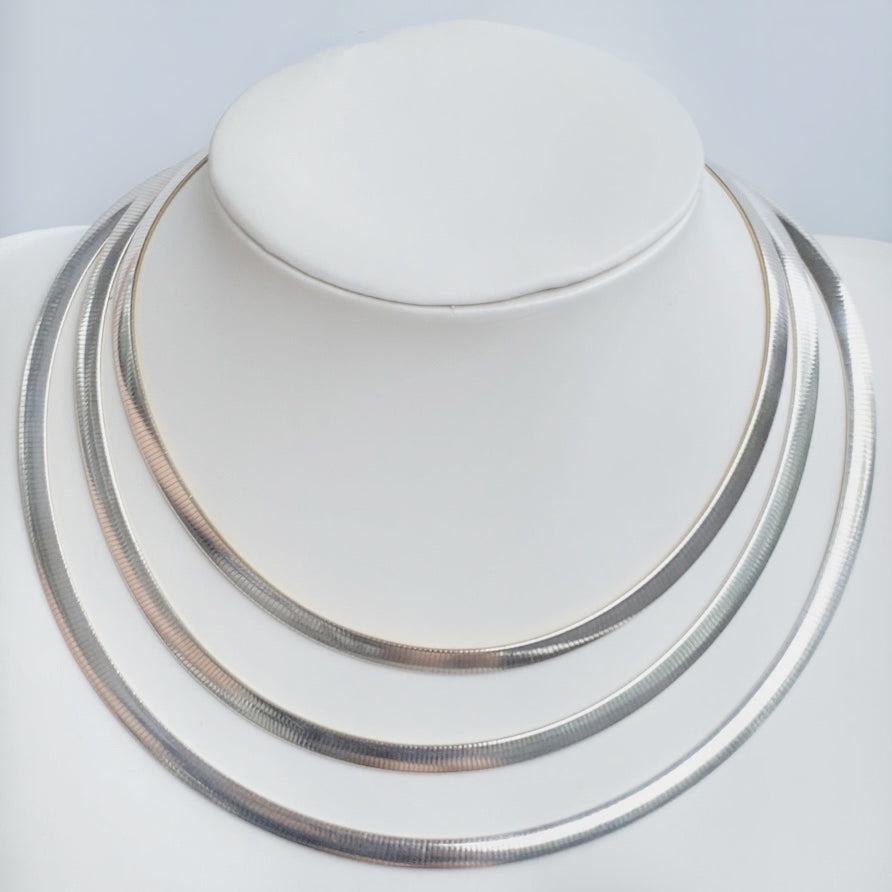 Two Tone Reversible Sterling Silver Omega Chain With 14k Gold Plated Italian 6mm Wide and 16 inches long.